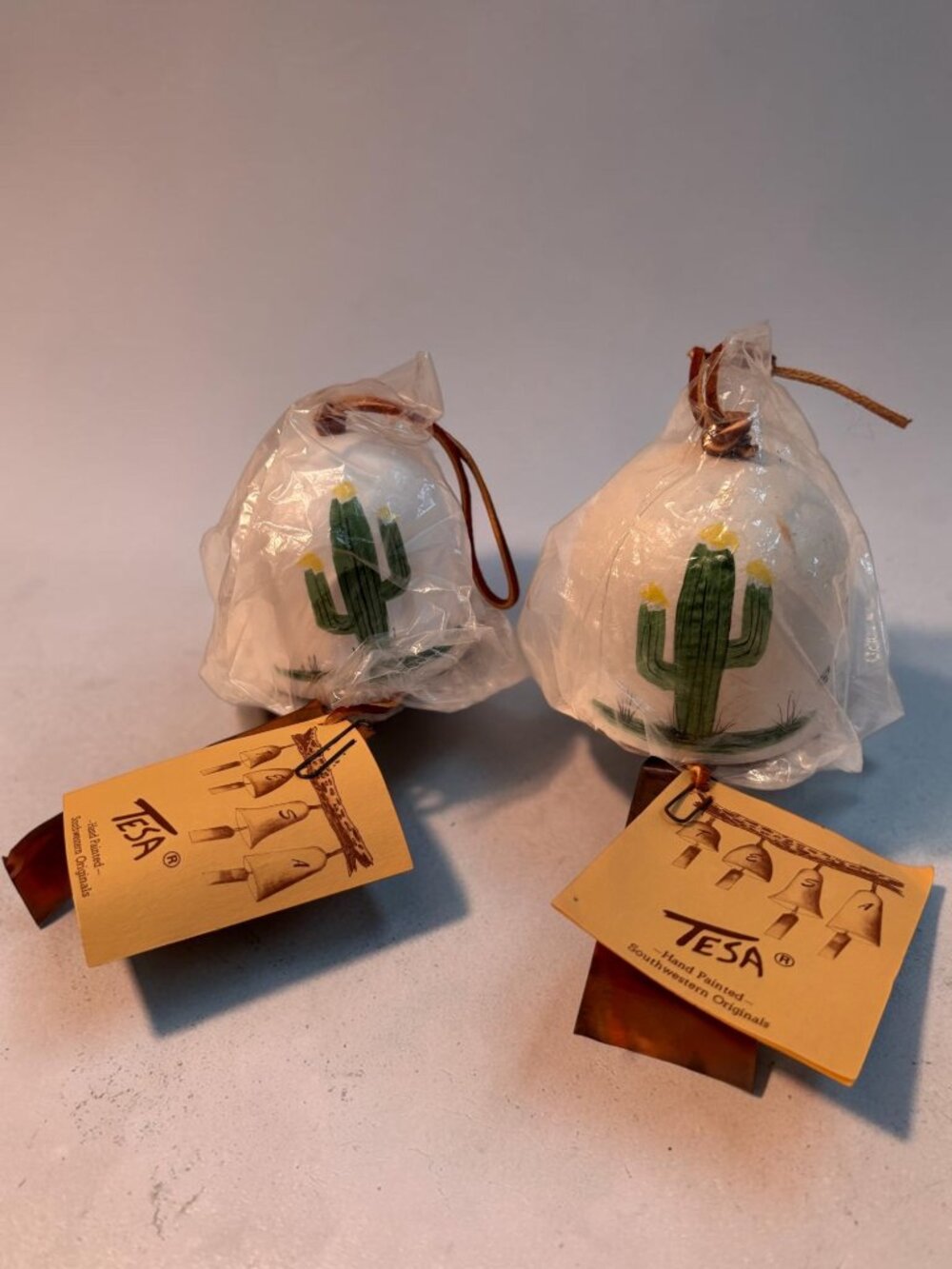 2 Hand-Painted Ceramic Bell With Cactus Design & Leather Loop By Tesa Southweste